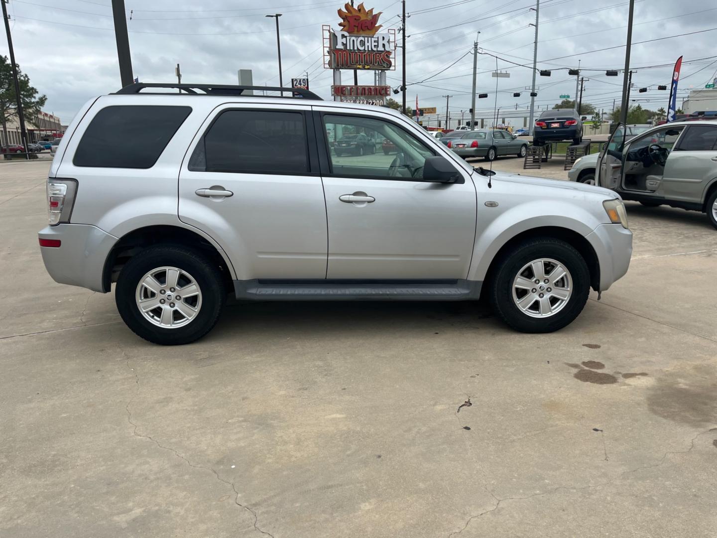 2009 SILVER /gray Mercury Mariner V6 2WD (4M2CU81G49K) with an 3.0L V6 engine, 6-Speed Automatic transmission, located at 14700 Tomball Parkway 249, Houston, TX, 77086, (281) 444-2200, 29.928619, -95.504074 - Photo#7